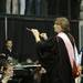Eastern Michigans Director of Bands, Dr. Mary Schneider, leads the choir in the national anthem during the opening of the commencement ceremony at the Convocation Center in Ypsilanti, on Sunday, April 29, 2012. For annarbor.com By: Joe Sharp